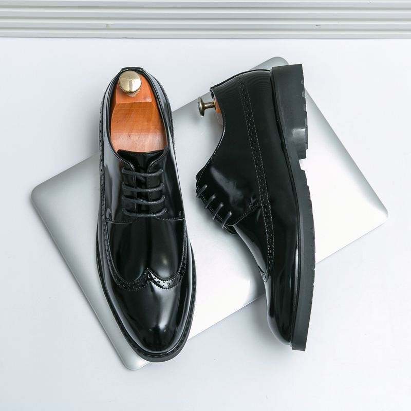 Executive Elegance: Premium Leather Oxford Slip-Ons" – it's memorable, sophisticated, and highlights quality without being too wordy 85$