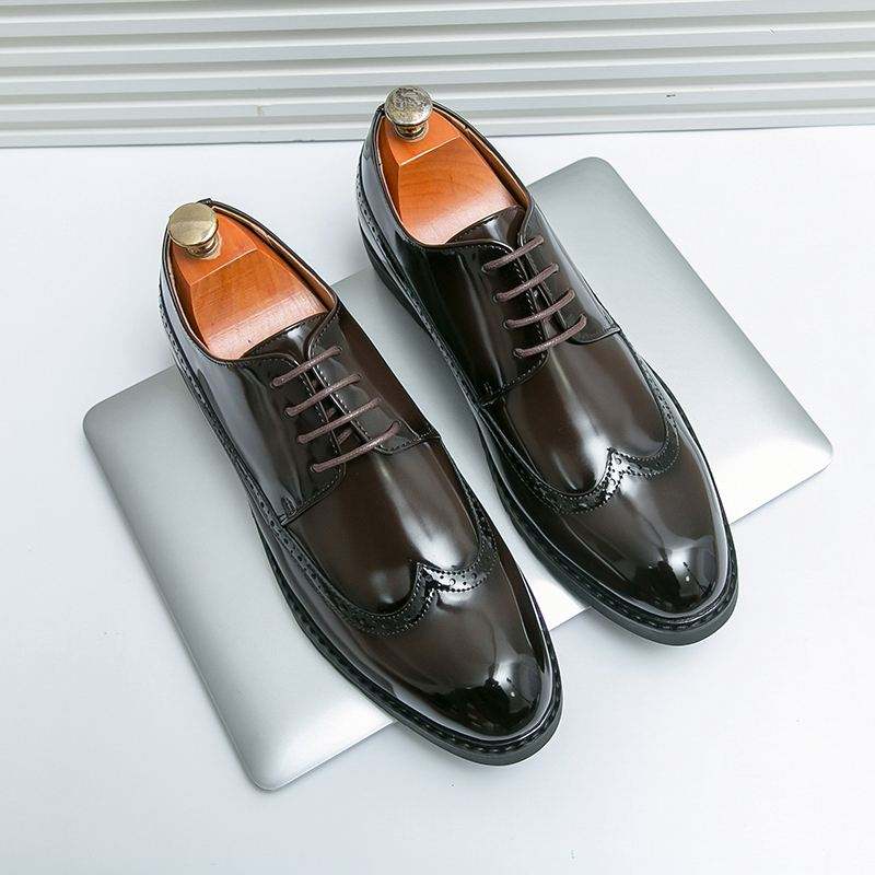 Executive Elegance: Premium Leather Oxford Slip-Ons" – it's memorable, sophisticated, and highlights quality without being too wordy 85$