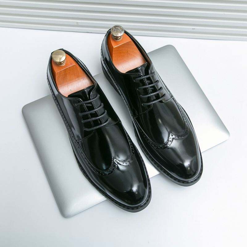Executive Elegance: Premium Leather Oxford Slip-Ons" – it's memorable, sophisticated, and highlights quality without being too wordy 85$