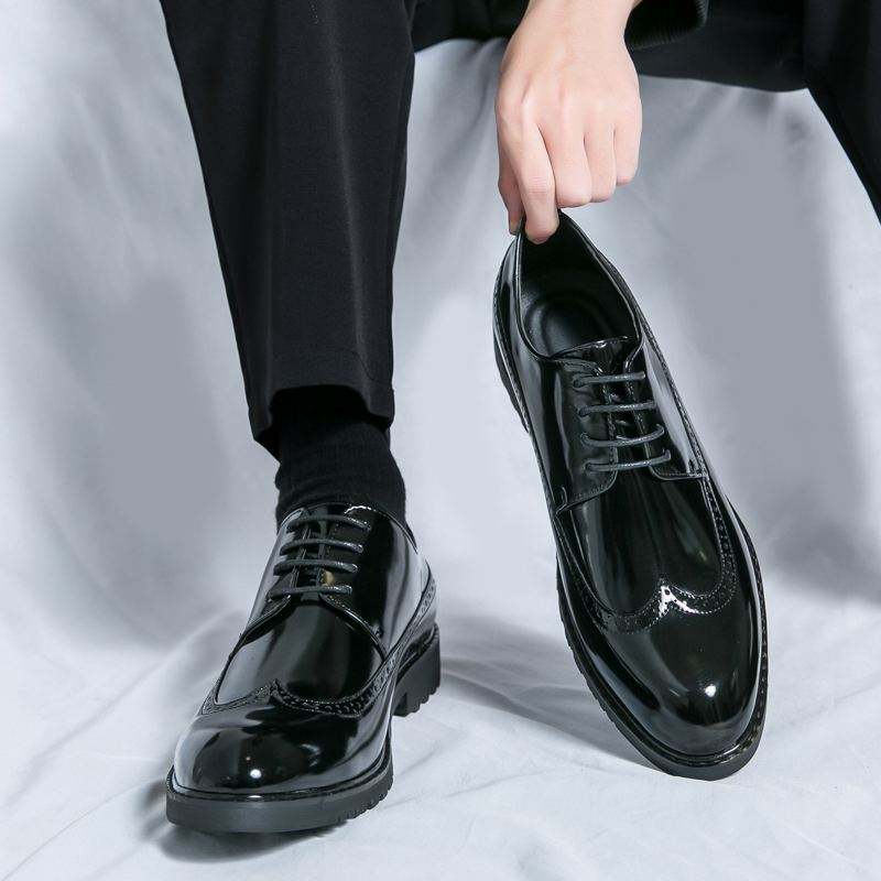 Executive Elegance: Premium Leather Oxford Slip-Ons" – it's memorable, sophisticated, and highlights quality without being too wordy 85$